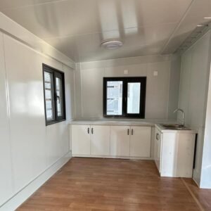 Prefab home kitchen with cabinetry, countertop and stainless steel sink – MOB TIMBERCREST interior