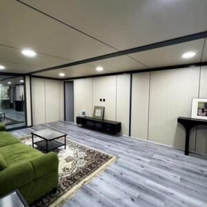 Two storey modular home interior living area with TV wall and luxury vinyl flooring – MOB TIMBERCREST