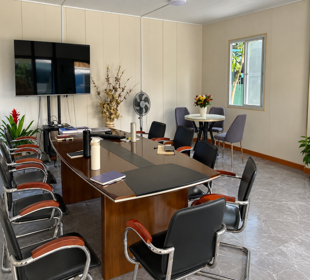 MOB RIDGEMONT interior fitted out as a conference room with a wall-mounted screen