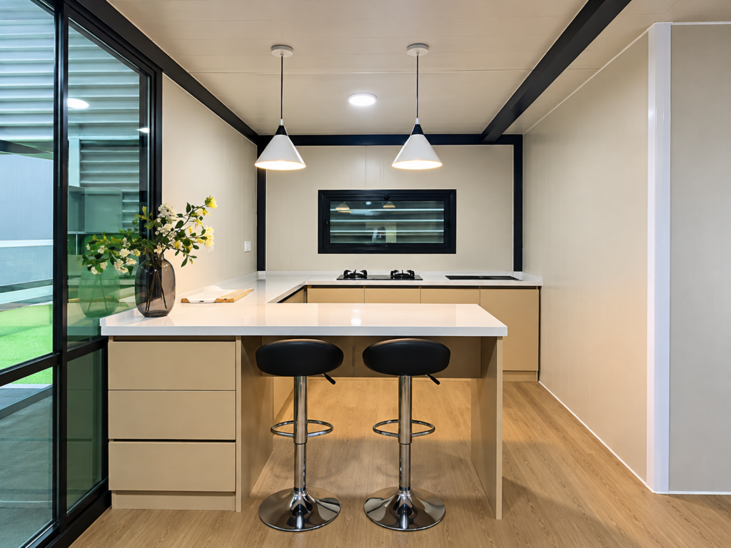 MOB SKYLINE kitchen with breakfast bar, pendant lights and bar stools